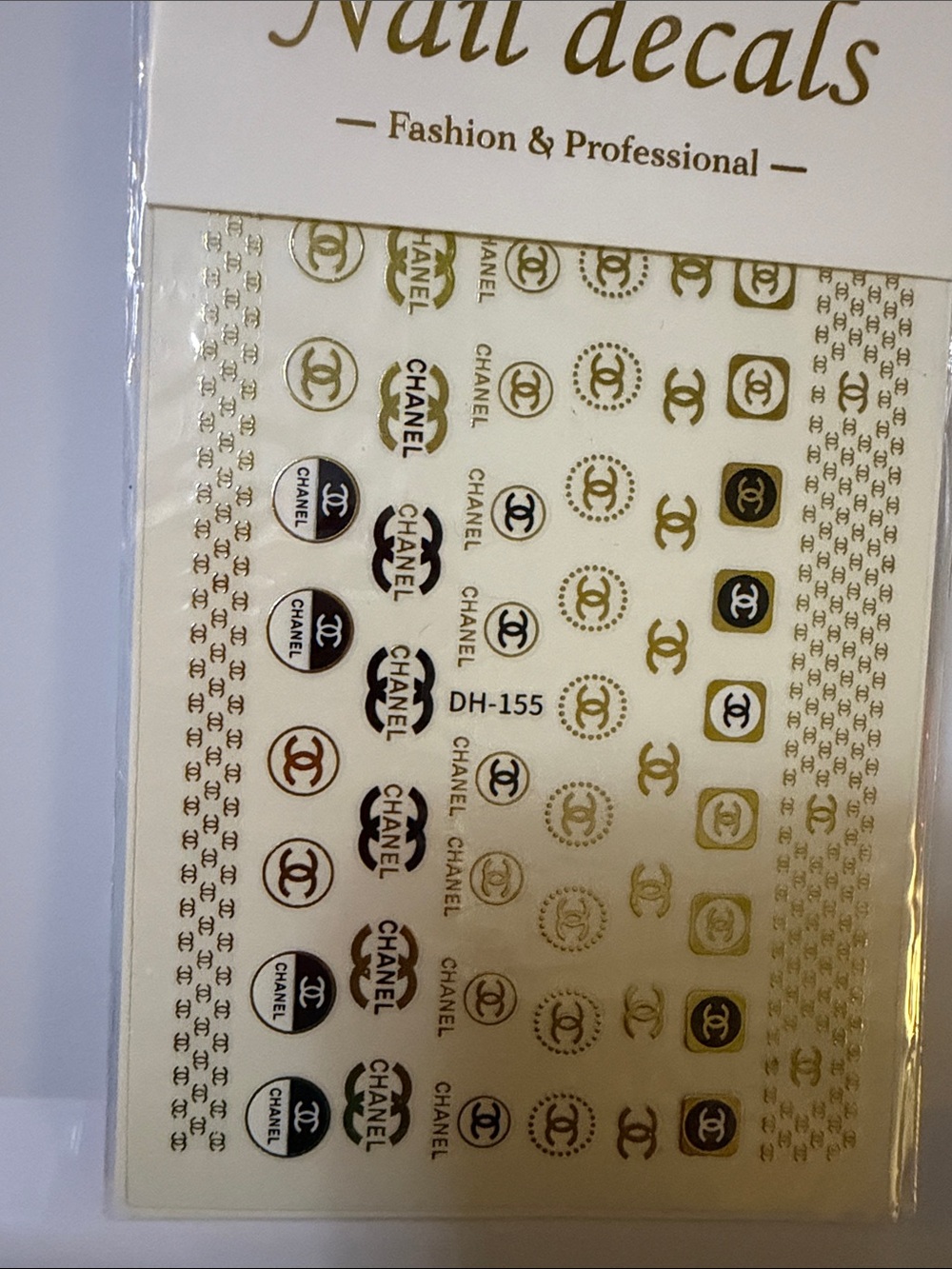 Gold and Black Nail Logo Stickers